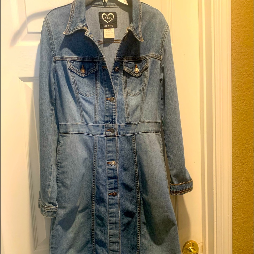 Vintage jean jacket-knee length with side pockets.